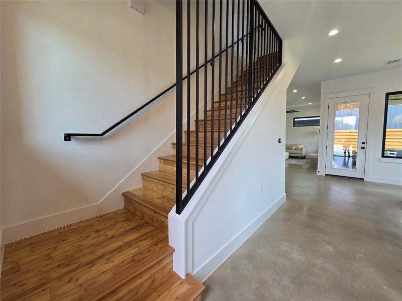 Metal wall accents on the staircase.