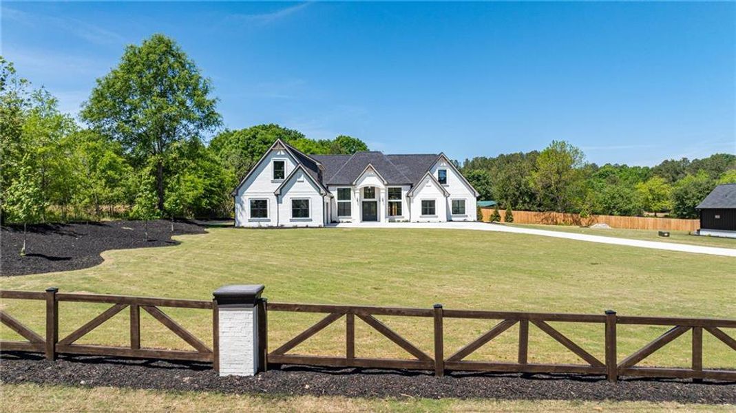 Front exterior of a new home in , Monroe, GA, highlighting curb appeal (Image 40).