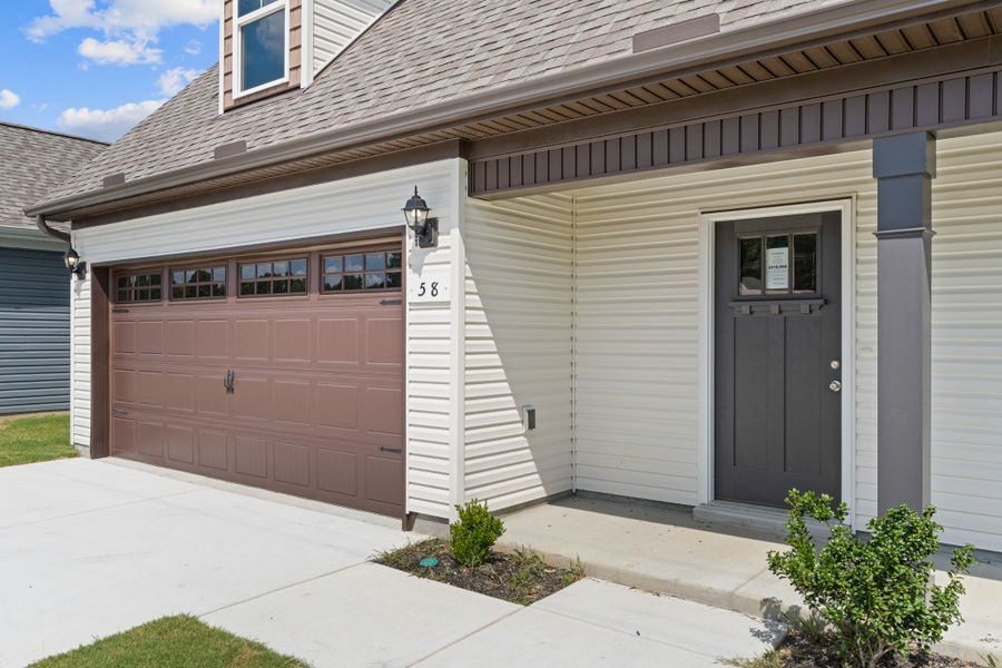 Front exterior of a new home in Stonehenge, Manchester, TN, highlighting curb appeal (Image 14). Front exterior of a new home in Stonehenge, Manchester, TN, highlighting curb appeal (Image 14).
