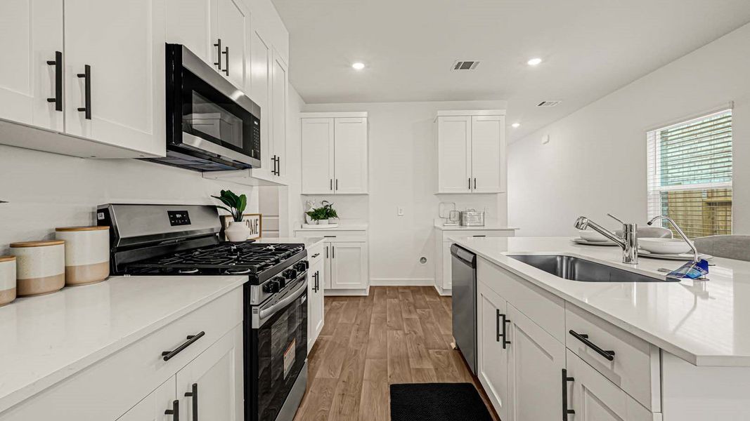 Furnished interior view inside a new home in Emberly, Beasley (Image 7).