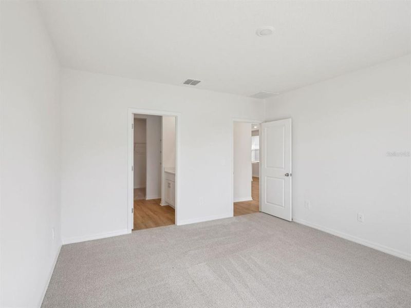 Spacious, unfurnished interior of a new home in Coasterra - Premier Series, Palmetto (Image 20).