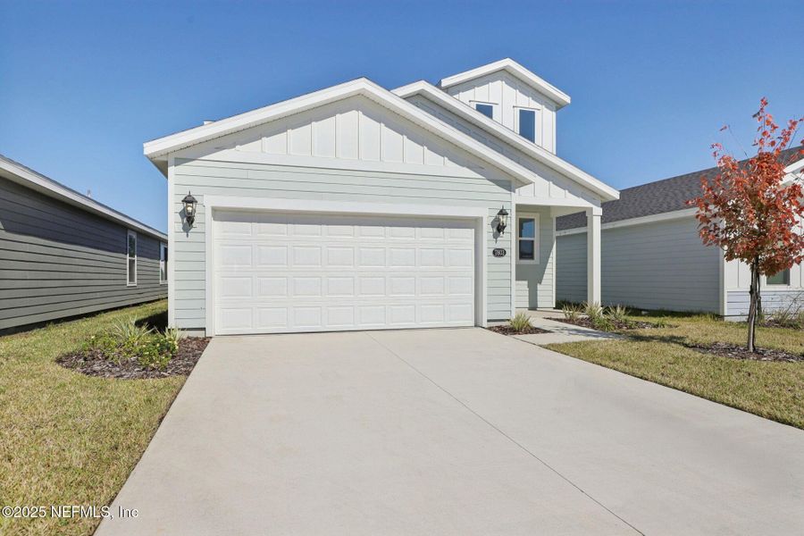 Front exterior of a new home in Kings Preserve, Jacksonville, FL, highlighting curb appeal (Image 20).