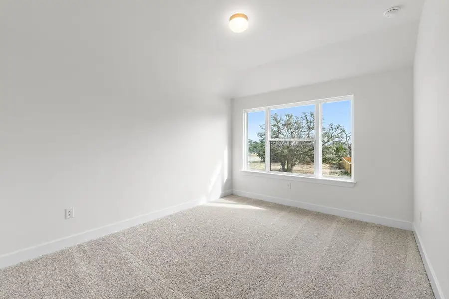 Spacious, unfurnished interior of a new home in Parmer Ranch, Georgetown (Image 43).