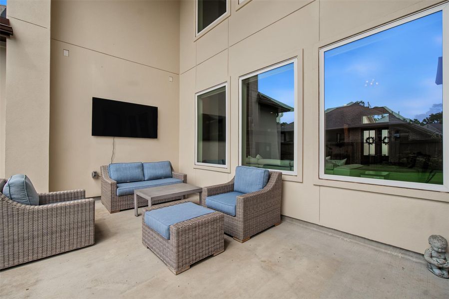 Exterior details and patio area of a home in The Highlands, Porter (Image 23).