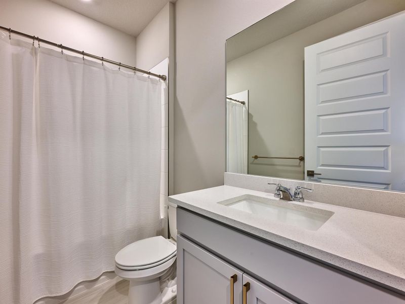Furnished interior view inside a new home in Azalea, Port St. Lucie (Image 19).