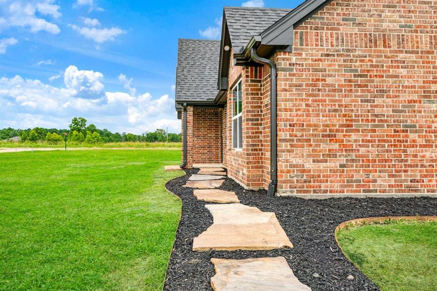 Exterior details and patio area of a home in , Powderly (Image 2). Exterior details and patio area of a home in , Powderly (Image 2).
