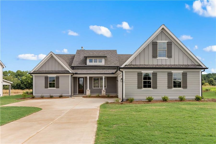 Front exterior of a new home in , Madison, GA, highlighting curb appeal (Image 2). Front exterior of a new home in , Madison, GA, highlighting curb appeal (Image 2).