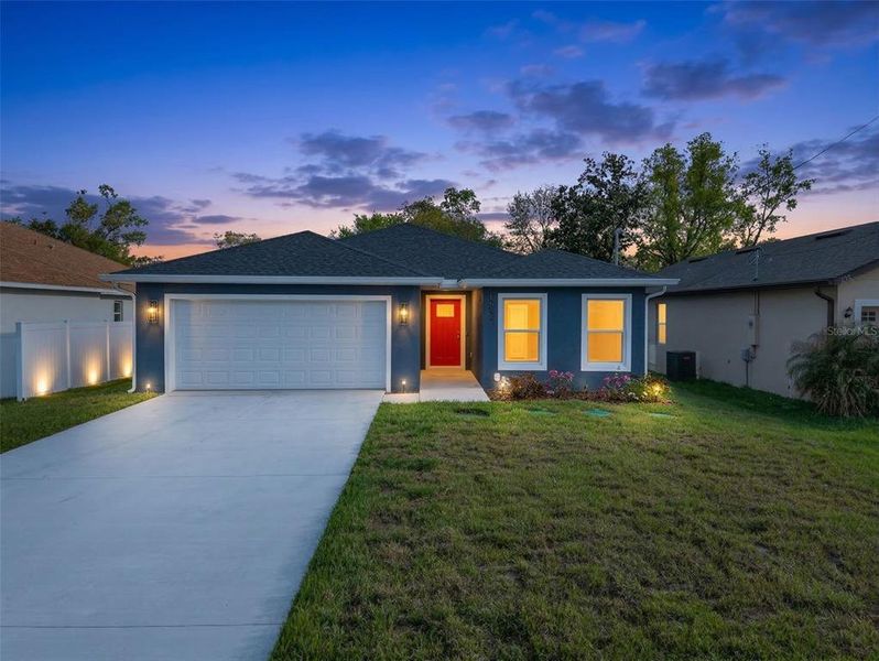 Front exterior of a new home in , Orlando, FL, highlighting curb appeal (Image 27).