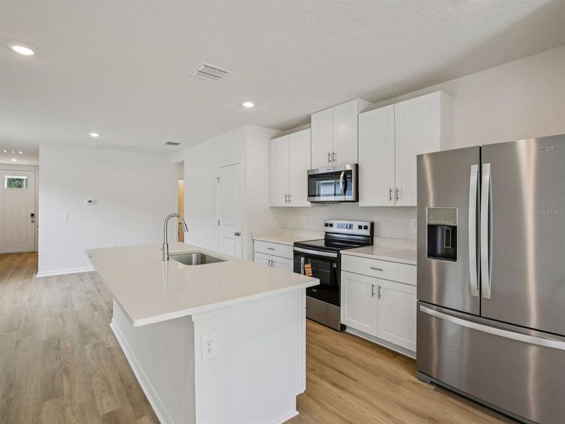 Furnished interior view inside a new home in Coasterra - Premier Series, Palmetto (Image 7). Furnished interior view inside a new home in Coasterra - Premier Series, Palmetto (Image 7).