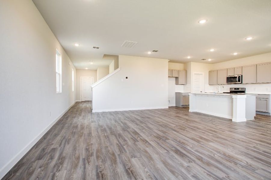 A large empty kitchen. A large empty kitchen.