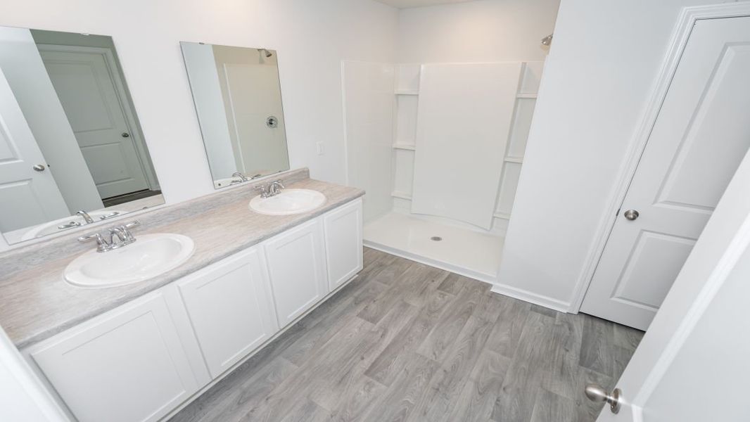 Representative furnished interior of a home built from the CALI by D.R. Horton in Jordanville Farms, Galivants Ferry (Image 12).