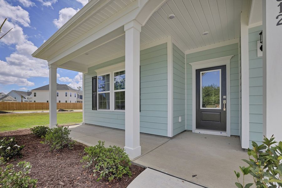 Exterior details and patio area of a home in Grand Park, Leland (Image 3).