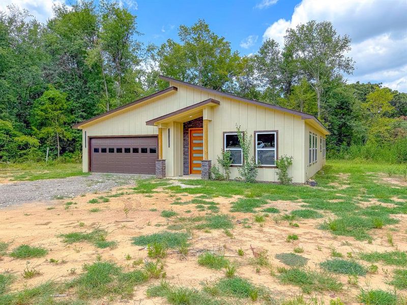 Front exterior of a new home in , Fairfield, TX, highlighting curb appeal (Image 13).