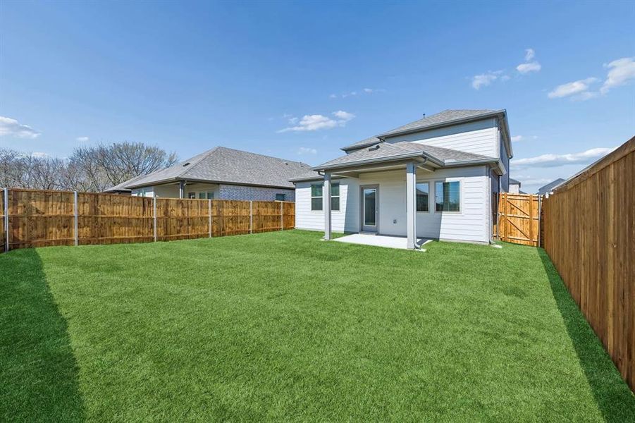 Covered Patio in the Mesquite home plan by Trophy Signature Homes – REPRESENTATIVE PHOTO Covered Patio in the Mesquite home plan by Trophy Signature Homes – REPRESENTATIVE PHOTO