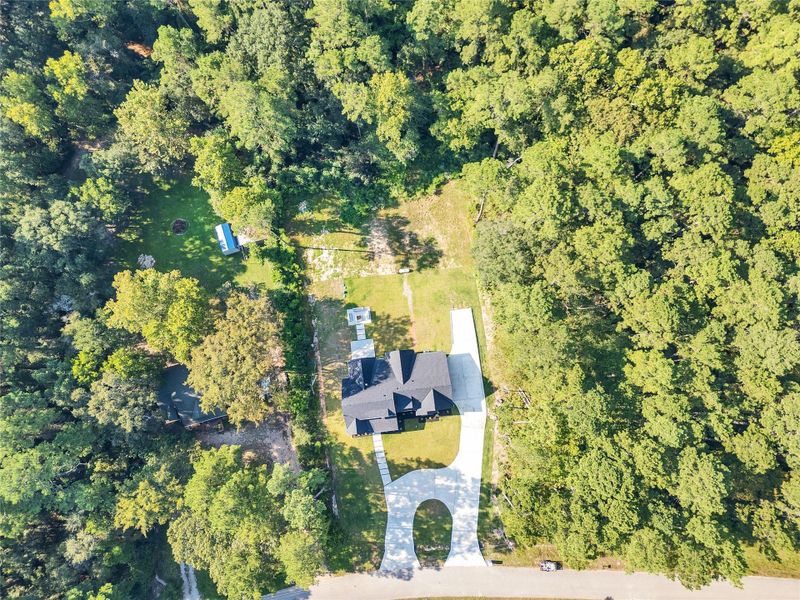 Front exterior of a new home in , Magnolia, TX, highlighting curb appeal (Image 33).