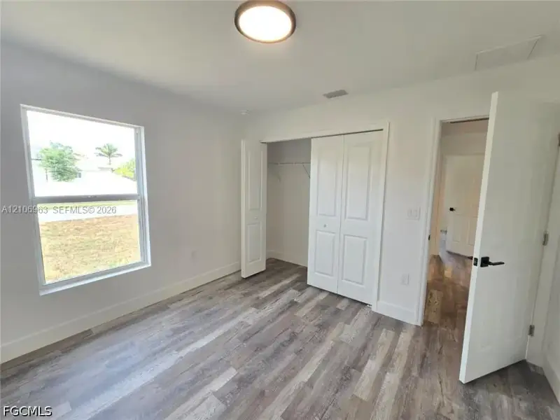 Spacious, unfurnished interior of a new home in , Port Charlotte (Image 16).