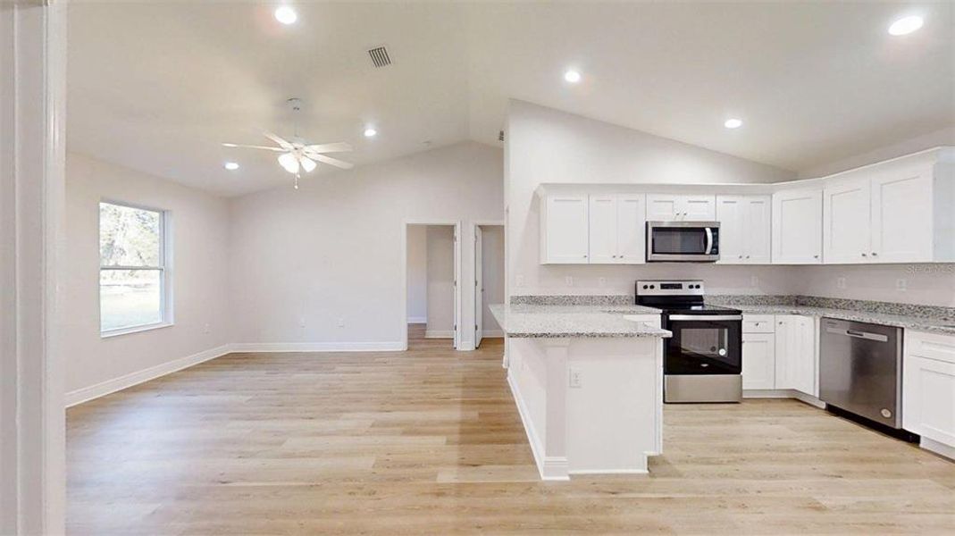 Furnished interior view inside a new home in , Dunnellon (Image 10).