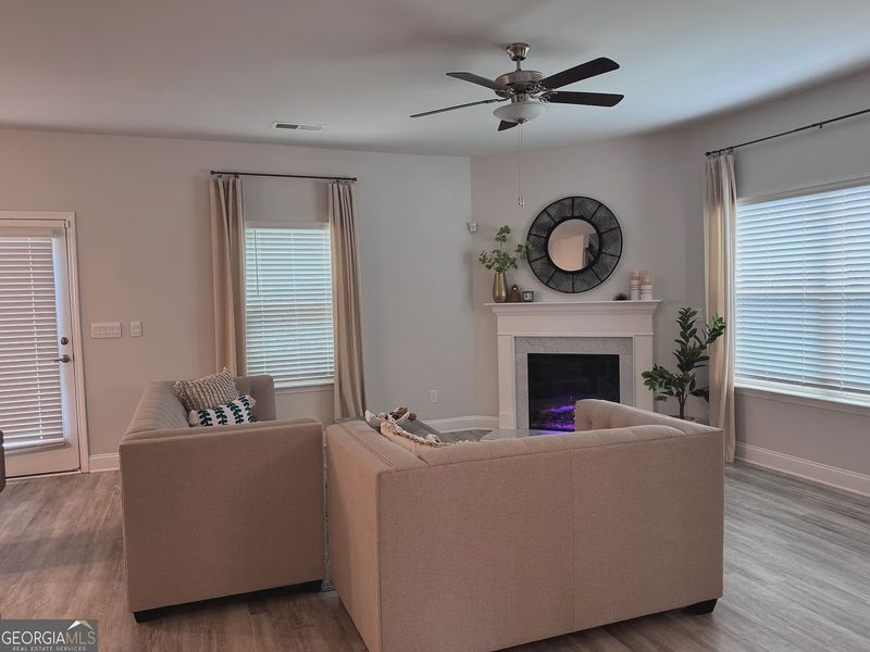 Furnished interior view inside a new home in Magnolia Villas, Cornelia (Image 8).