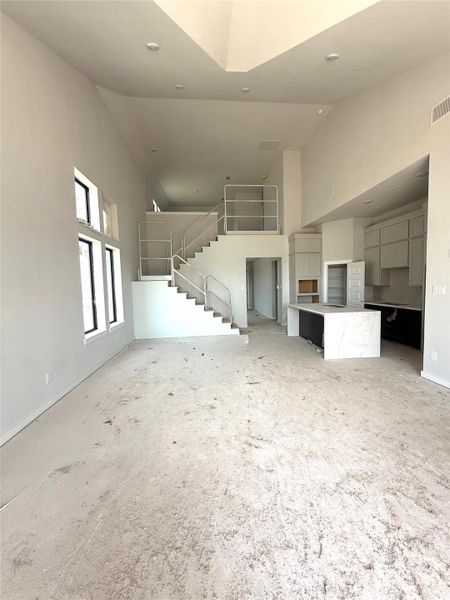 Follow the staircase in this wide open family room upstairs to a spacious gameroom and media room! Follow the staircase in this wide open family room upstairs to a spacious gameroom and media room!