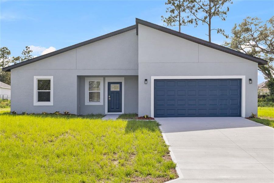 Front exterior of a new home in , Ocala, FL, highlighting curb appeal (Image 19).