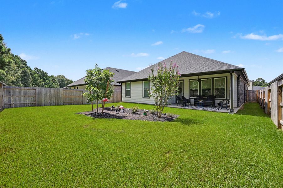 Exterior details and patio area of a home in , Conroe (Image 3). Exterior details and patio area of a home in , Conroe (Image 3).
