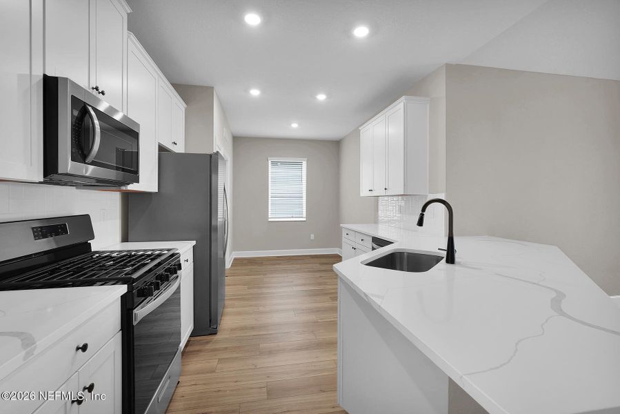Furnished interior view inside a new home in , Jacksonville (Image 14).