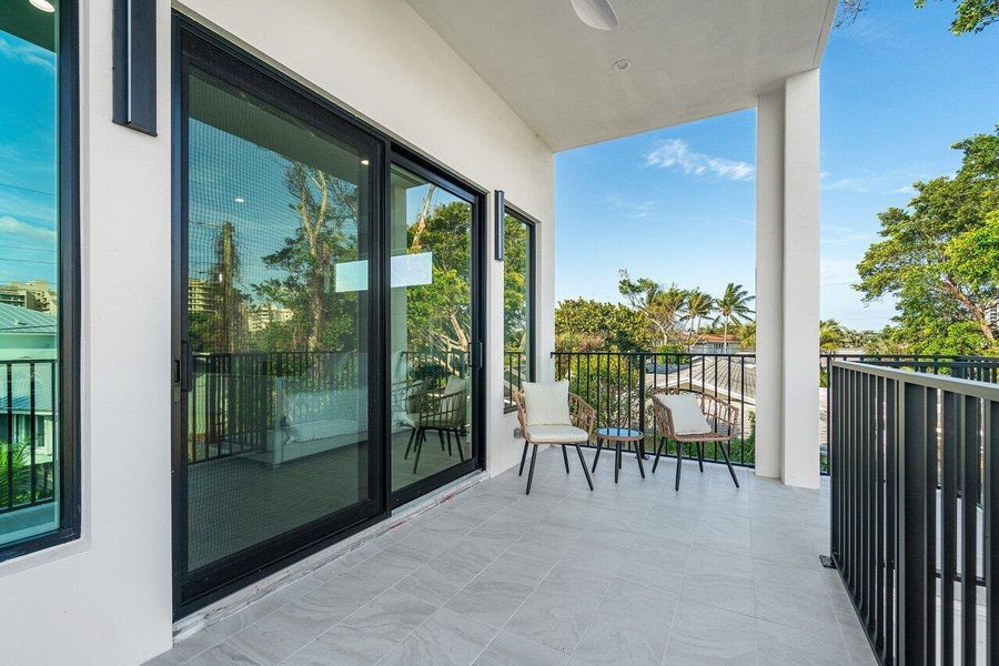 Exterior details and patio area of a home in , Juno Beach (Image 32).