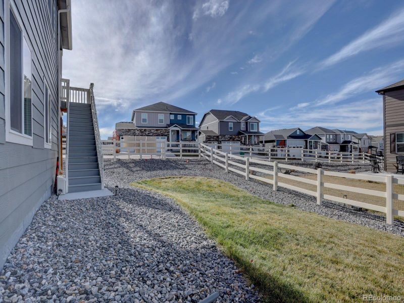 Exterior details and patio area of a home in Crystal Valley Pine Ridge, Castle Rock (Image 28).