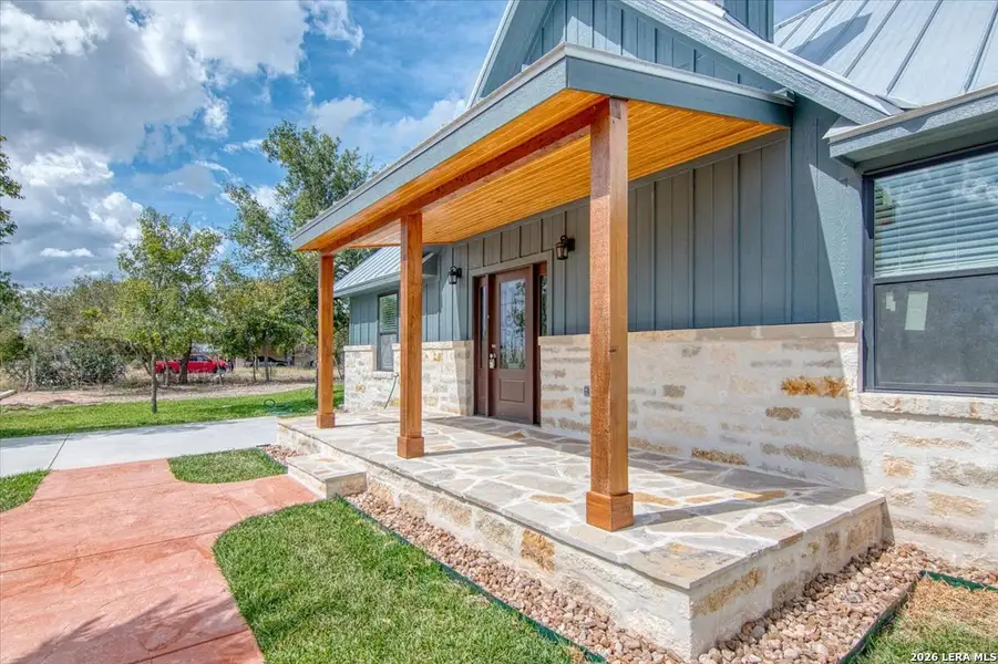 Exterior details and patio area of a home in , Harper (Image 3). Exterior details and patio area of a home in , Harper (Image 3).