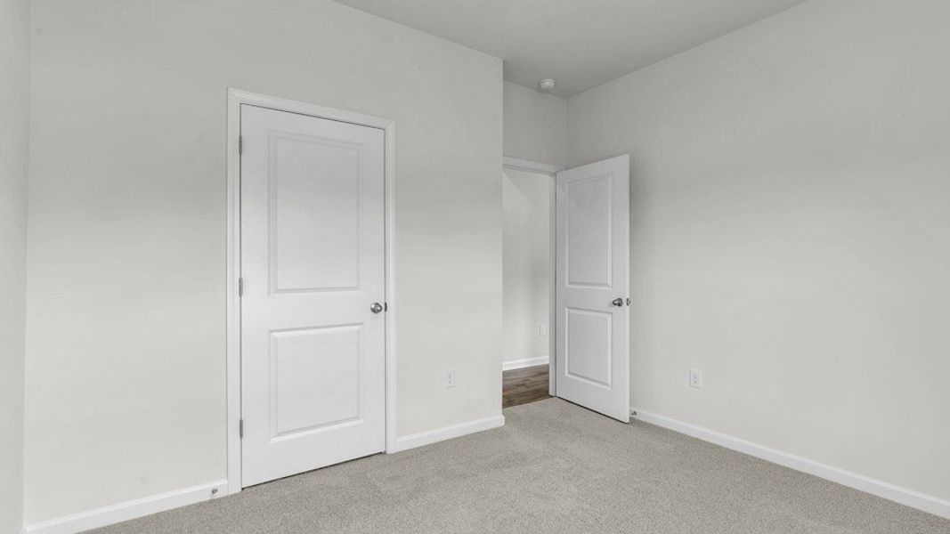 Spacious, unfurnished interior of a new home in The Preserve at Kinsley, Jamestown (Image 25). Spacious, unfurnished interior of a new home in The Preserve at Kinsley, Jamestown (Image 25).