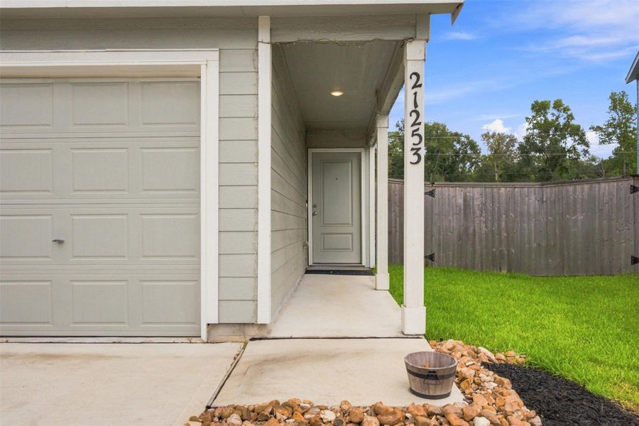 Exterior details and patio area of a home in Tavola, New Caney (Image 23).