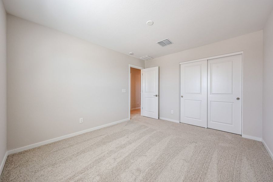 A room with white doors.