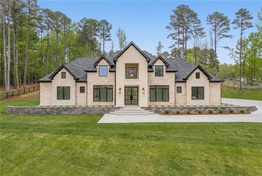 Front exterior of a new home in , Dacula, GA, highlighting curb appeal (Image 28).
