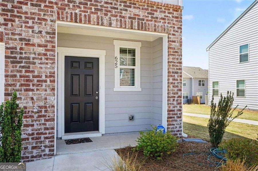 Exterior details and patio area of a home in , Locust Grove (Image 3). Exterior details and patio area of a home in , Locust Grove (Image 3).