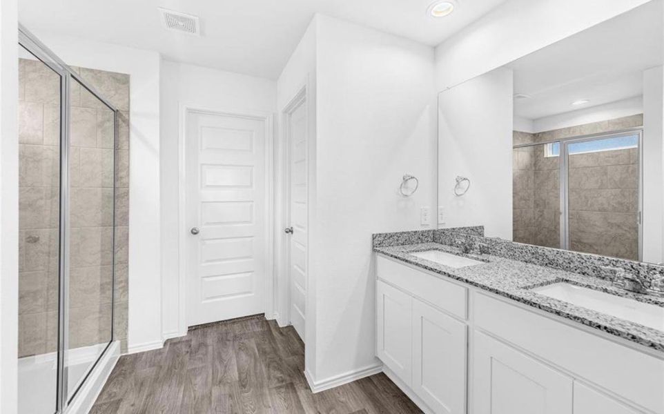 Primary Bathroom with Dual Sinks Primary Bathroom with Dual Sinks