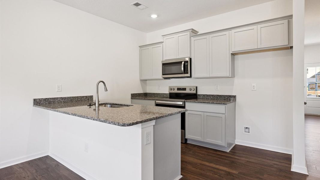 Furnished interior view inside a new home in Cherokee Crossing, Kodak (Image 4).