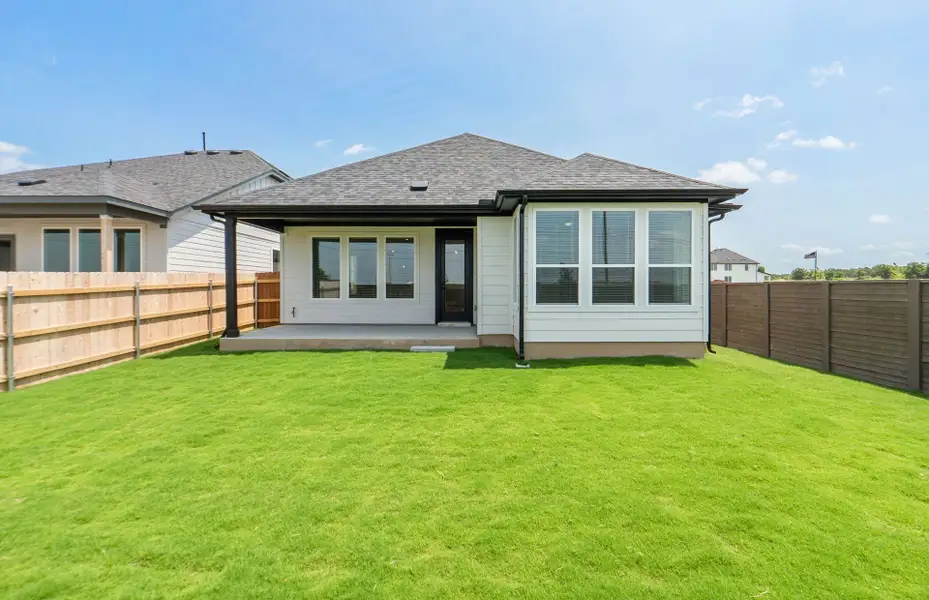 Exterior details and patio area of a home in Kuempel Farms, Pflugerville (Image 28).