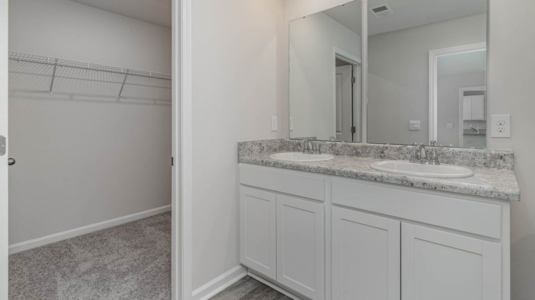 Representative furnished interior of a home built from the CURTIS by D.R. Horton in The Cottages at Blake Farm, Wilmington (Image 26). Representative furnished interior of a home built from the CURTIS by D.R. Horton in The Cottages at Blake Farm, Wilmington (Image 26).