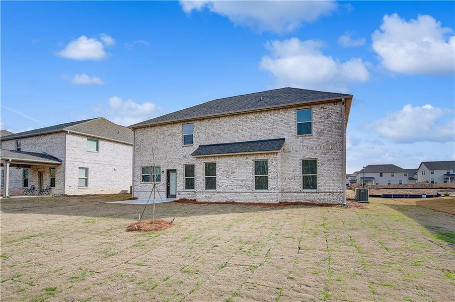 Exterior details and patio area of a home in Adagio, Dacula (Image 17). Exterior details and patio area of a home in Adagio, Dacula (Image 17).
