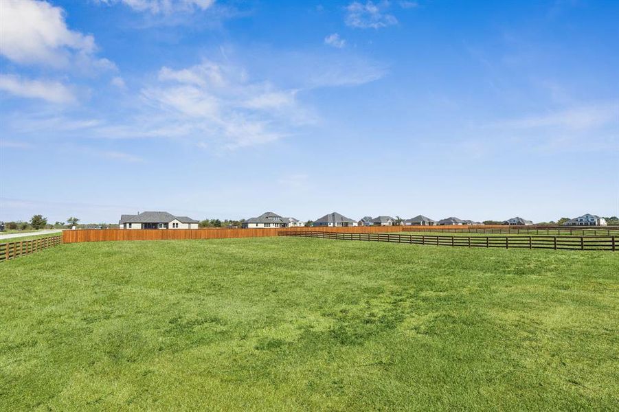 View of yard with a view of countryside