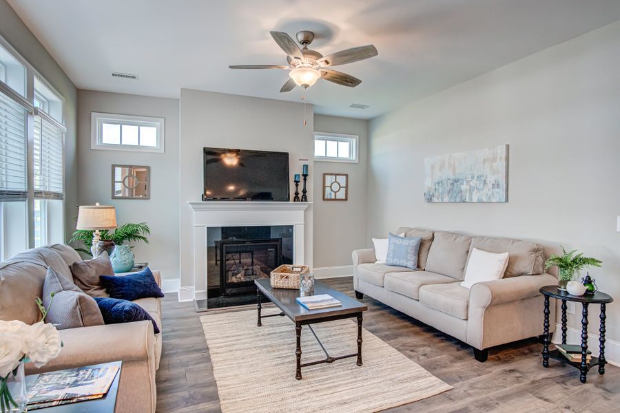 Representative furnished interior of a home built from the Portico by McKee Homes in The Cottages at 78 North, Sanford (Image 4).