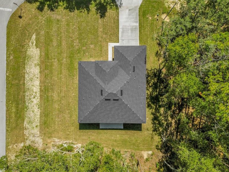Front exterior of a new home in , Citrus Springs, FL, highlighting curb appeal (Image 17).