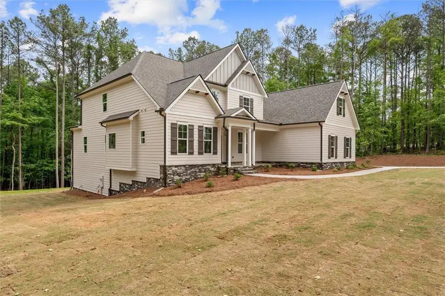 Front exterior of a new home in , Winston, GA, highlighting curb appeal (Image 6). Front exterior of a new home in , Winston, GA, highlighting curb appeal (Image 6).