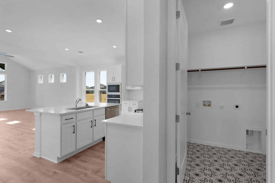 Furnished interior view inside a new home in Highland Village, Georgetown (Image 9).