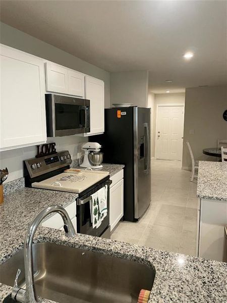 Furnished interior view inside a new home in , New Port Richey (Image 12). Furnished interior view inside a new home in , New Port Richey (Image 12).