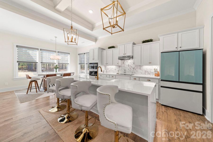 Kitchen with Sustainable Wood Laminate and Waterfall Island