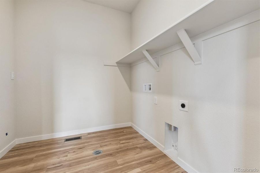 Spacious, unfurnished interior of a new home in Floret Collection at Parkdale Commons, Lafayette (Image 20).