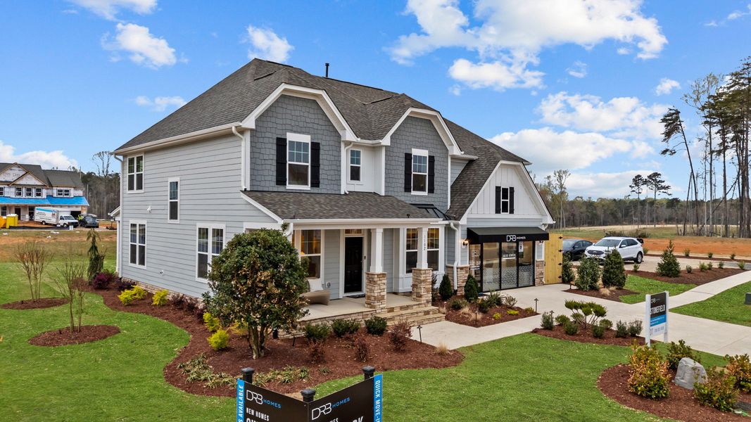 Representative exterior photo of a completed home built from the Stonefield by DRB Homes in Weavers Pointe, Zebulon, NC (Image 28).