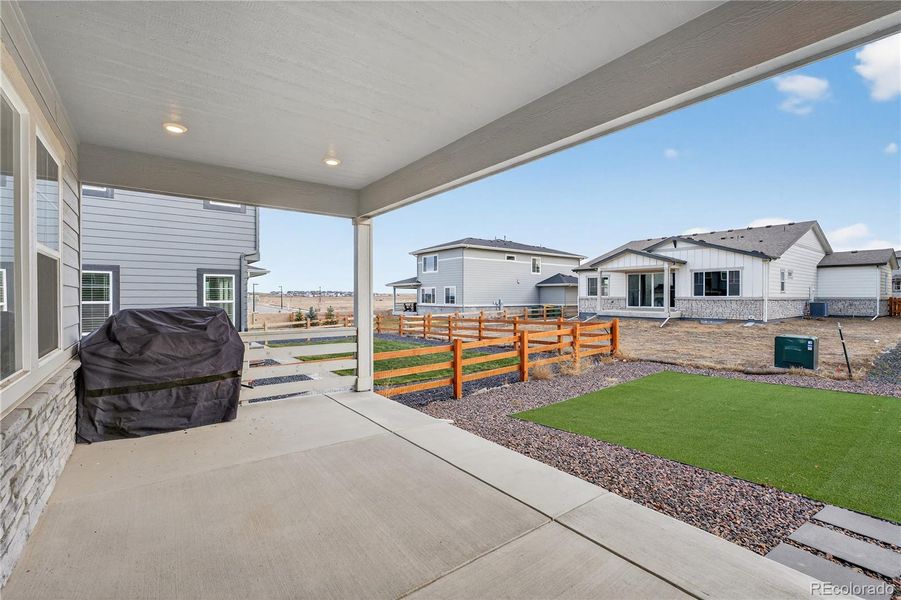 Exterior details and patio area of a home in Prelude at The Aurora Highlands, Aurora (Image 4).