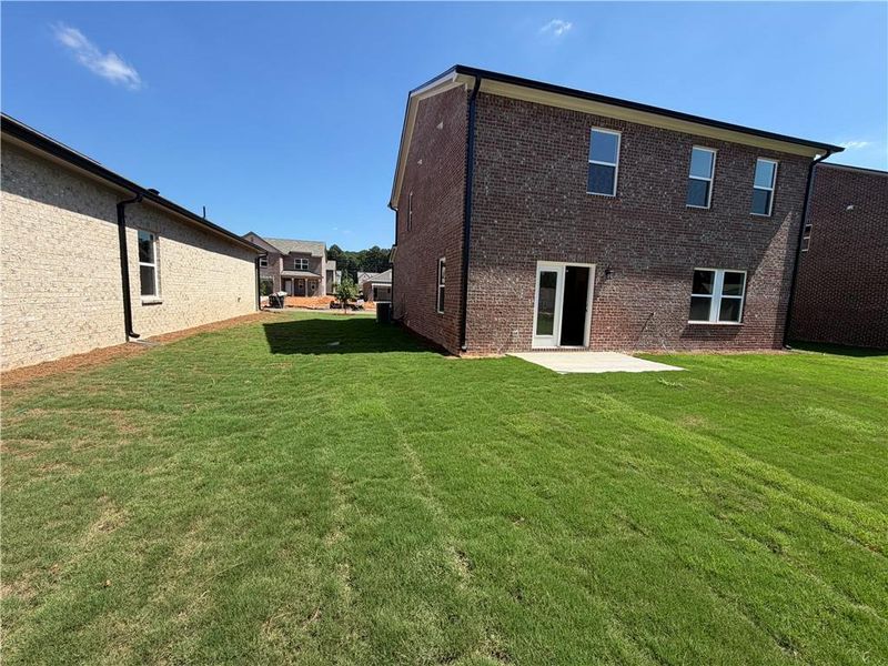 Exterior details and patio area of a home in Kendall Grove, McDonough (Image 3).